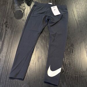 Nike Kids Black Leggings with White Swoosh